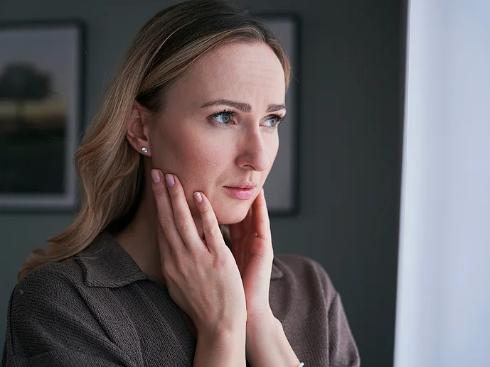 Generalisierte Pustulöse Psoriasis bei junger verzweifelter Frau